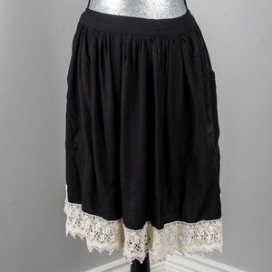 NWOT black full skirt with lace trim - M